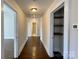 Bright hallway with hardwood floors and built-in shelving at 400 E 27Th St, Kannapolis, NC 28083