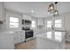 Modern white kitchen with stainless steel appliances at 400 E 27Th St, Kannapolis, NC 28083