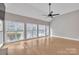 Bright Gathering room with hardwood floors, vaulted ceiling and wall of windows at 4025 Weddington Manor Ct, Matthews, NC 28104