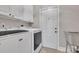 Laundry room with washer, dryer, and a stainless steel sink at 4025 Weddington Manor Ct, Matthews, NC 28104