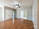 Spacious bonus room with hardwood floors and French doors at 5052 Haven Lodge Rd, Matthews, NC 28104