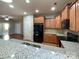 Modern kitchen with stainless steel appliances at 5052 Haven Lodge Rd, Matthews, NC 28104