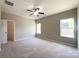 Main bedroom with double closets and two windows at 5052 Haven Lodge Rd, Matthews, NC 28104