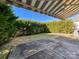 Patio area with striped retractable awning at 5052 Haven Lodge Rd, Matthews, NC 28104