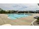 Community lap pool and leisure pool with shade umbrellas at 5052 Haven Lodge Rd, Matthews, NC 28104