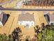 An aerial view of the house shows the large back yard with the relaxing patio at 5057 Spratt Rd, York, SC 29745