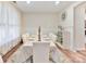 Elegant dining room featuring wainscoting, modern lighting, and seating for six guests at 5057 Spratt Rd, York, SC 29745