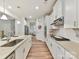 Well-lit kitchen with stainless steel appliances, ample counter space, and hardwood flooring at 5057 Spratt Rd, York, SC 29745