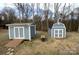 Two gray storage sheds with white trim, one with a barn door at 517 Grassy Creek Run, Chester, SC 29706