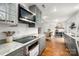 Modern kitchen featuring granite countertops, stainless steel appliances, and ample cabinet space at 523 Fence Post Ln, Matthews, NC 28105