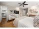 Comfortable main bedroom offering a calming space with a dresser and a ceiling fan creates a restful atmosphere at 523 Fence Post Ln, Matthews, NC 28105