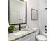 Bathroom with granite vanity and black matte fixtures at 6325 Rockwell W Blvd, Charlotte, NC 28269