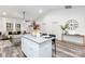 Open concept kitchen island with seating and granite top at 6325 Rockwell W Blvd, Charlotte, NC 28269