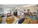 Open concept dining area with mid century modern table and chairs at 6737 Lancer Dr, Charlotte, NC 28226