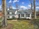 Brick house with a manicured lawn and steps at 6737 Lancer Dr, Charlotte, NC 28226