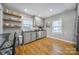 Modern kitchen with gray cabinets and stainless steel appliances at 6737 Lancer Dr, Charlotte, NC 28226