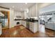 Modern kitchen with white cabinets, granite countertops, and stainless steel appliances at 6737 Lancer Dr, Charlotte, NC 28226