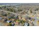 Aerial view of suburban neighborhood, featuring homes and roads at 6816 Idlewild Rd, Charlotte, NC 28212