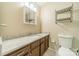 Bathroom with granite countertop, single sink vanity, and shower/tub combo at 6816 Idlewild Rd, Charlotte, NC 28212