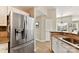 Stainless steel refrigerator in a well-lit kitchen at 7844 Village Harbor Dr, Cornelius, NC 28031