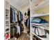 Large walk-in closet with ample shelving and hanging space at 7844 Village Harbor Dr, Cornelius, NC 28031