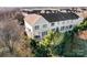 Aerial view of townhouses and surrounding trees at 804 Skybrook Falls Dr, Huntersville, NC 28078