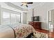 Main bedroom with large window and hardwood floors at 804 Skybrook Falls Dr, Huntersville, NC 28078