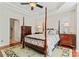 Bright bedroom with hardwood floors and ensuite bathroom access at 804 Skybrook Falls Dr, Huntersville, NC 28078