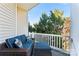 Relaxing deck with wicker furniture and treetop views at 804 Skybrook Falls Dr, Huntersville, NC 28078