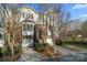 Beautiful brick townhome with 2-car garage and lush landscaping at 804 Skybrook Falls Dr, Huntersville, NC 28078