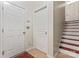 Stairwell with wood stairs and storage at 804 Skybrook Falls Dr, Huntersville, NC 28078