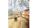 Wooden deck with lattice sides and wicker chair at 901 Maple Ave, Salisbury, NC 28144