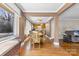 Open concept dining room with hardwood floors, flowing into the kitchen and living area at 901 Maple Ave, Salisbury, NC 28144