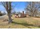 Charming brick home featuring a brick chimney and mature trees in a peaceful neighborhood at 901 Maple Ave, Salisbury, NC 28144