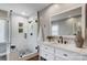 Updated bathroom with white subway tiles and a frameless shower at 9236 Silver Pine Dr, Charlotte, NC 28277