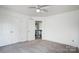 Bedroom with double door closet and view of the upper hallway at 9236 Silver Pine Dr, Charlotte, NC 28277