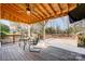 Relaxing deck with wooden flooring and seating area at 9236 Silver Pine Dr, Charlotte, NC 28277