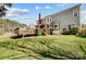 Gray house with large deck and backyard at 9236 Silver Pine Dr, Charlotte, NC 28277