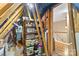 Unfinished attic space with shelving for storage at 10122 Oxford Landing Ln, Charlotte, NC 28270