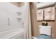 Simple bathroom with a shower/tub combination and plenty of storage at 10122 Oxford Landing Ln, Charlotte, NC 28270