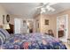 Spacious bedroom with floral bedding and access to bathroom at 10122 Oxford Landing Ln, Charlotte, NC 28270