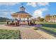 Charming gazebo in a landscaped community park at 1026 Slew O Gold Ln, Indian Trail, NC 28079