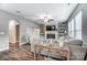 Living room with fireplace, hardwood floors, and access to hallway at 1026 Slew O Gold Ln, Indian Trail, NC 28079