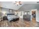 Main bedroom with wood floors and ensuite bathroom access at 1026 Slew O Gold Ln, Indian Trail, NC 28079