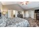 Main bedroom with wood floors, high ceilings and access to other rooms at 1026 Slew O Gold Ln, Indian Trail, NC 28079