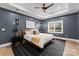 Serene main bedroom with wood floors and large window at 12217 Pine Valley Club Dr, Charlotte, NC 28277