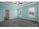 Spacious bedroom with light blue walls and grey carpet at 131 E Northstone Rd, Mooresville, NC 28115