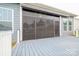 Screened porch with dark-framed windows and deck at 131 E Northstone Rd, Mooresville, NC 28115