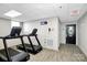 Modern gym with treadmills and wood flooring at 1315 East Blvd # 203, Charlotte, NC 28203