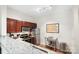 Modern kitchen with granite countertops and stainless steel appliances at 1315 East Blvd # 203, Charlotte, NC 28203